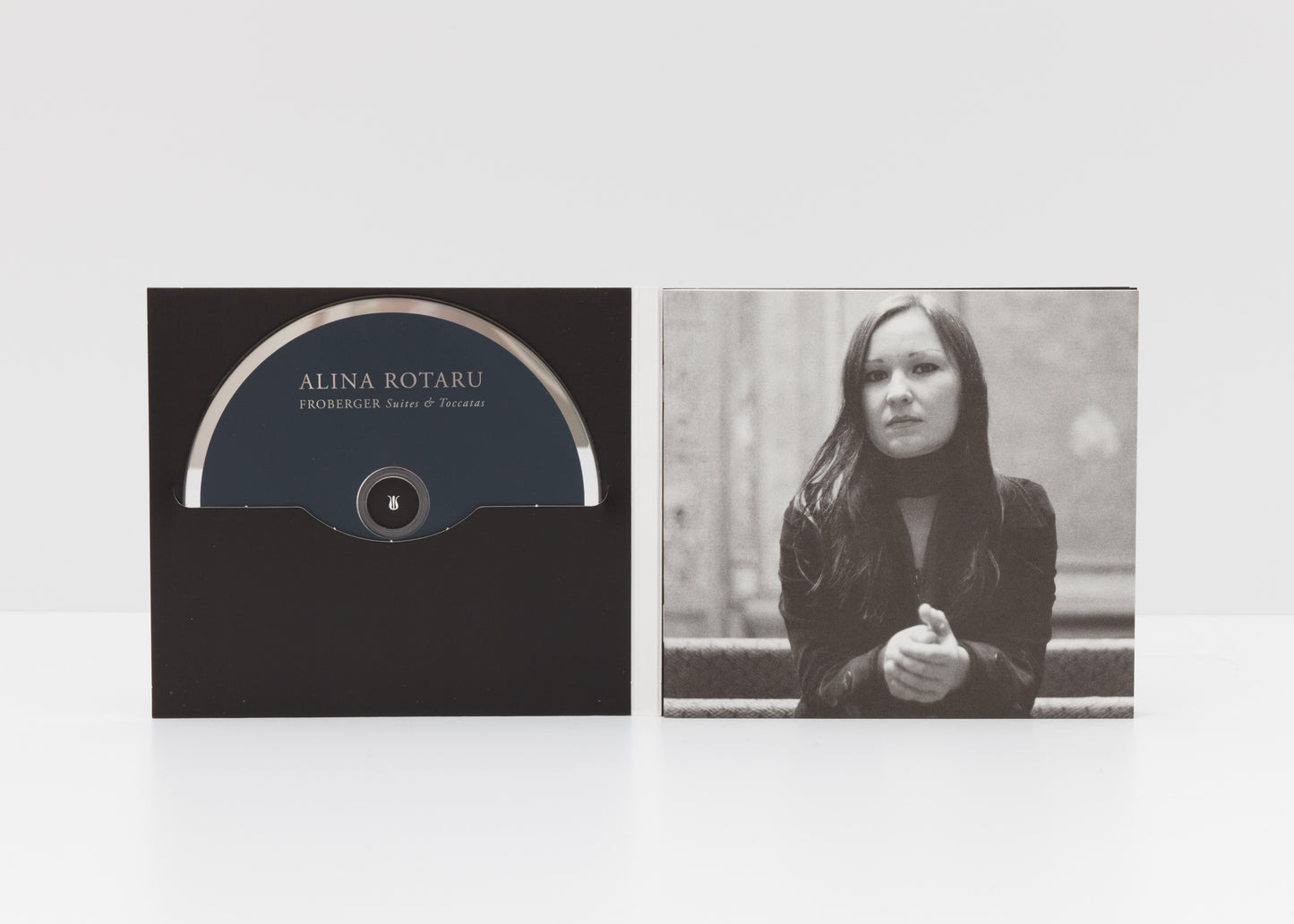 Digipack detail of the album "Froberger: Toccatas & Suites" by Alina Rotaru, showing a monochrome portrait of the artist