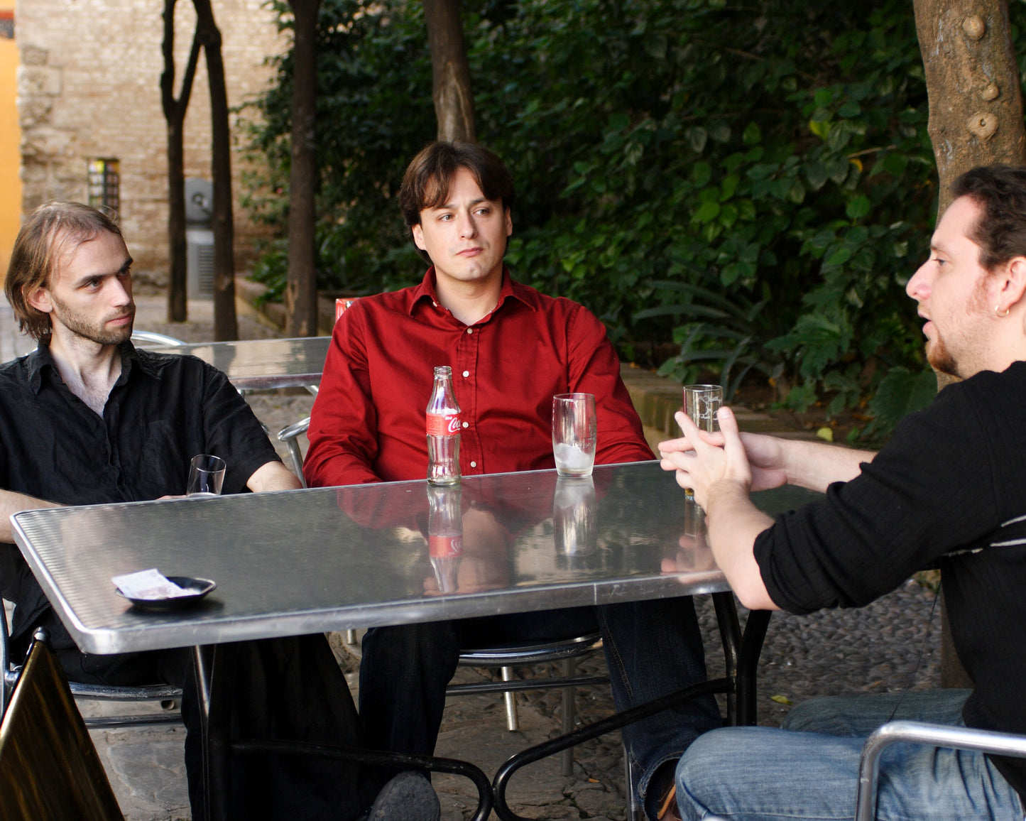 Producer Jonas Niederstadt in interview with the artists Ariel Abramovich and Jose Hernandez-Pastor in the old town of Seville, Spain.