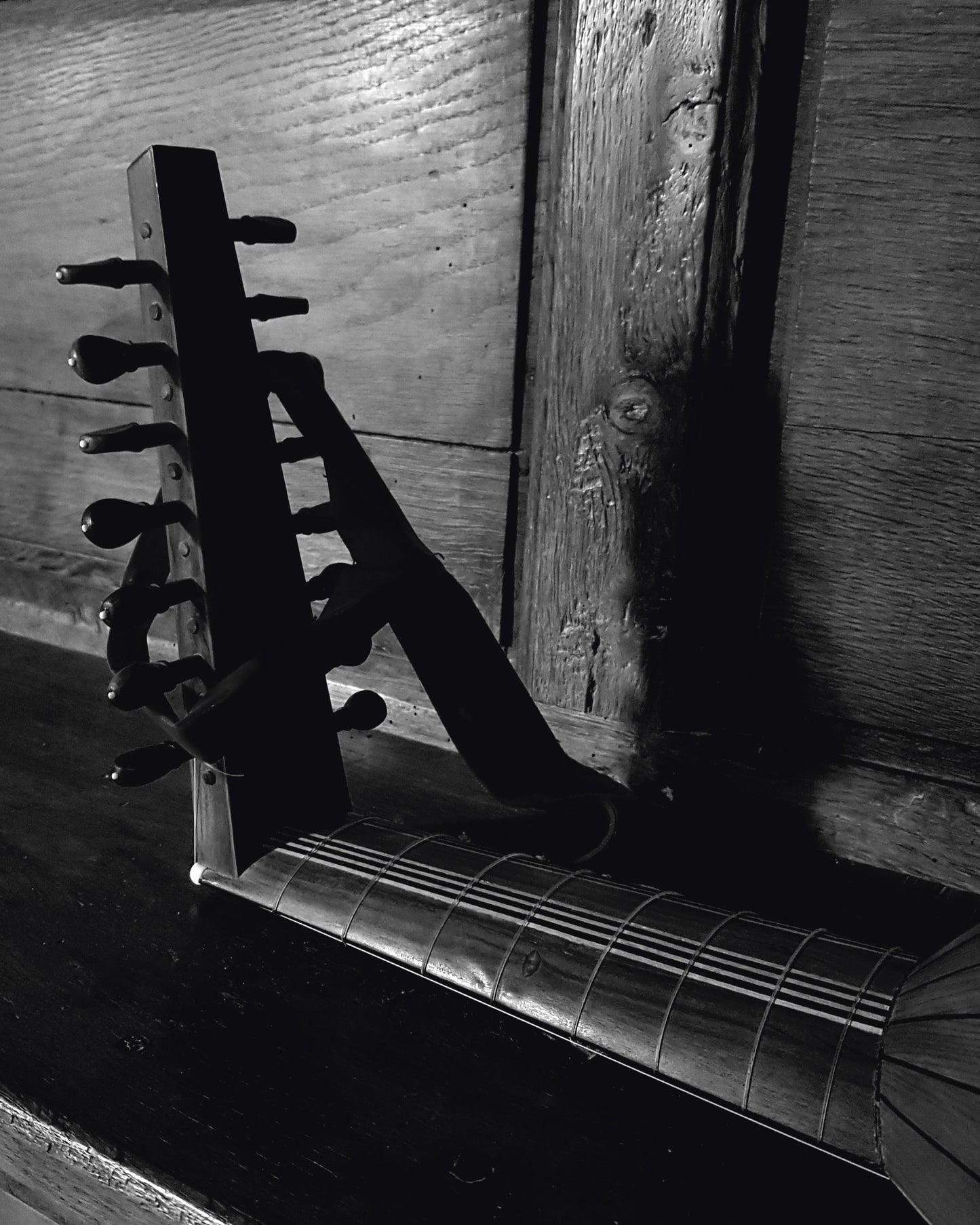 Detail of a lute on a wooden bench, at the recording sessions for Florent Marie's album "Sweet melancholy". 