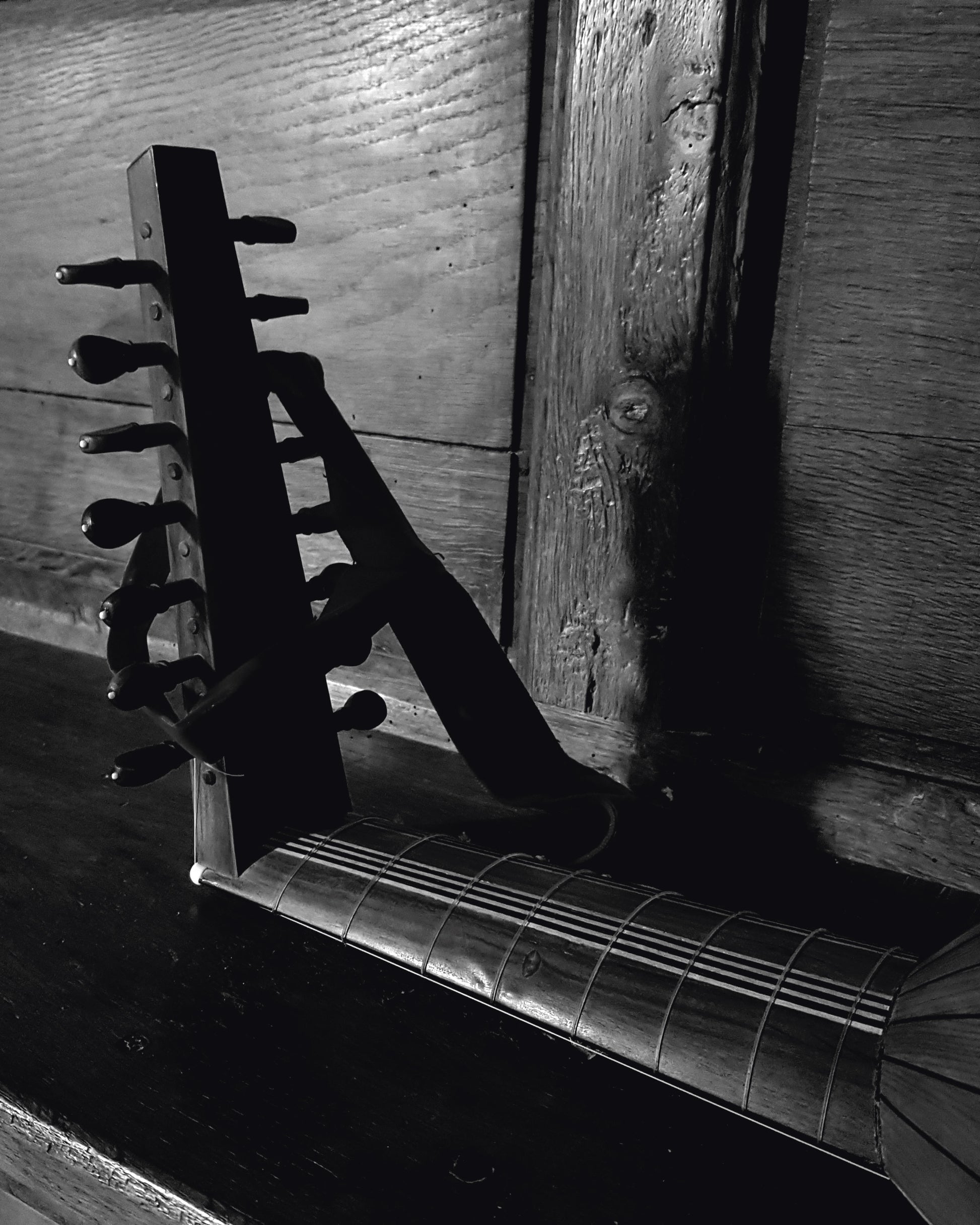 Detail of a lute on a wooden bench, at the recording sessions for Florent Marie's album "Sweet melancholy". 