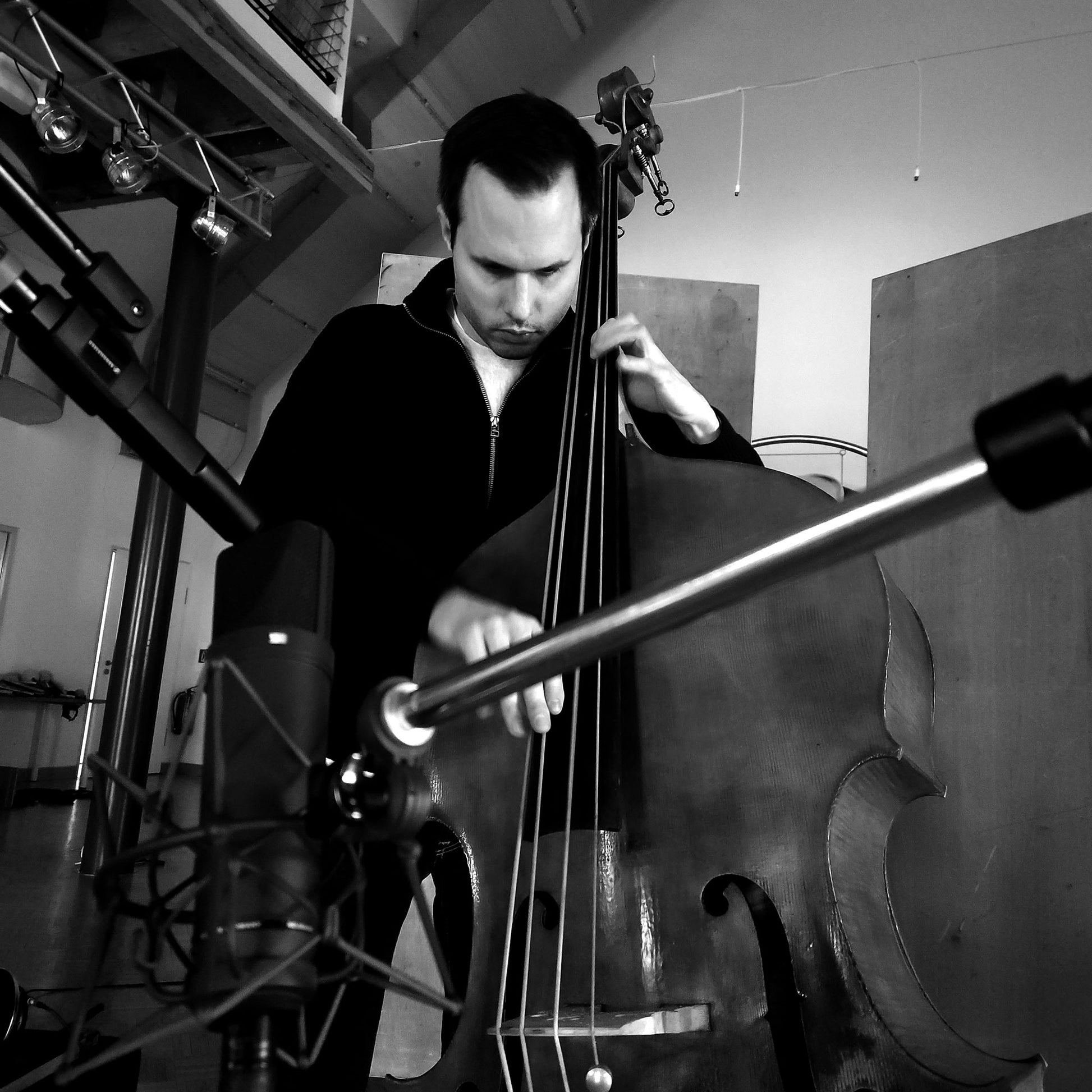 Fridolin Blumer playing double bass during the recording sessions for his album "Anklam" in the Klanghaus Studio, Klein Jasedow. 