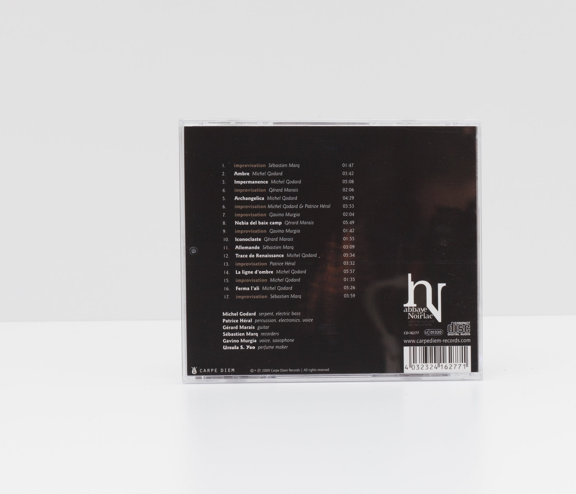 Jewelcase back cover of "Le concert des parfums" by Michel Godard, showing the tracklist of the album