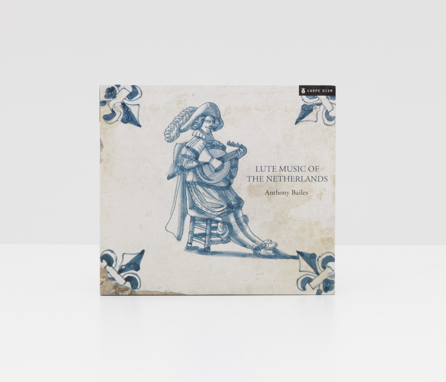 Digipack album cover of "Lute music of the Netherlands" by Anthony Bailes showing an antique Dutch ceramic tile with a picture of a lutenist