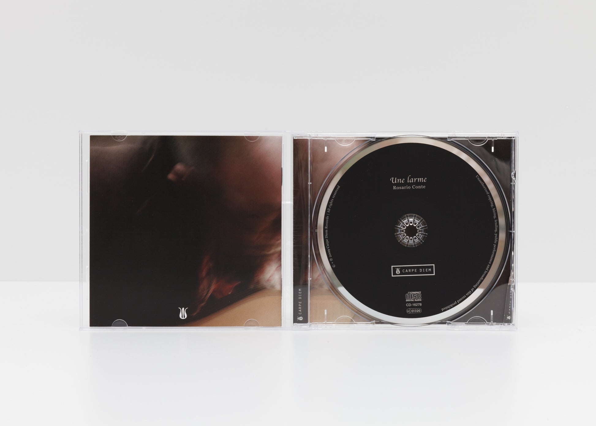 Jewelcase detail of the album "Une Larme" by Rosario Conte, showing the CD