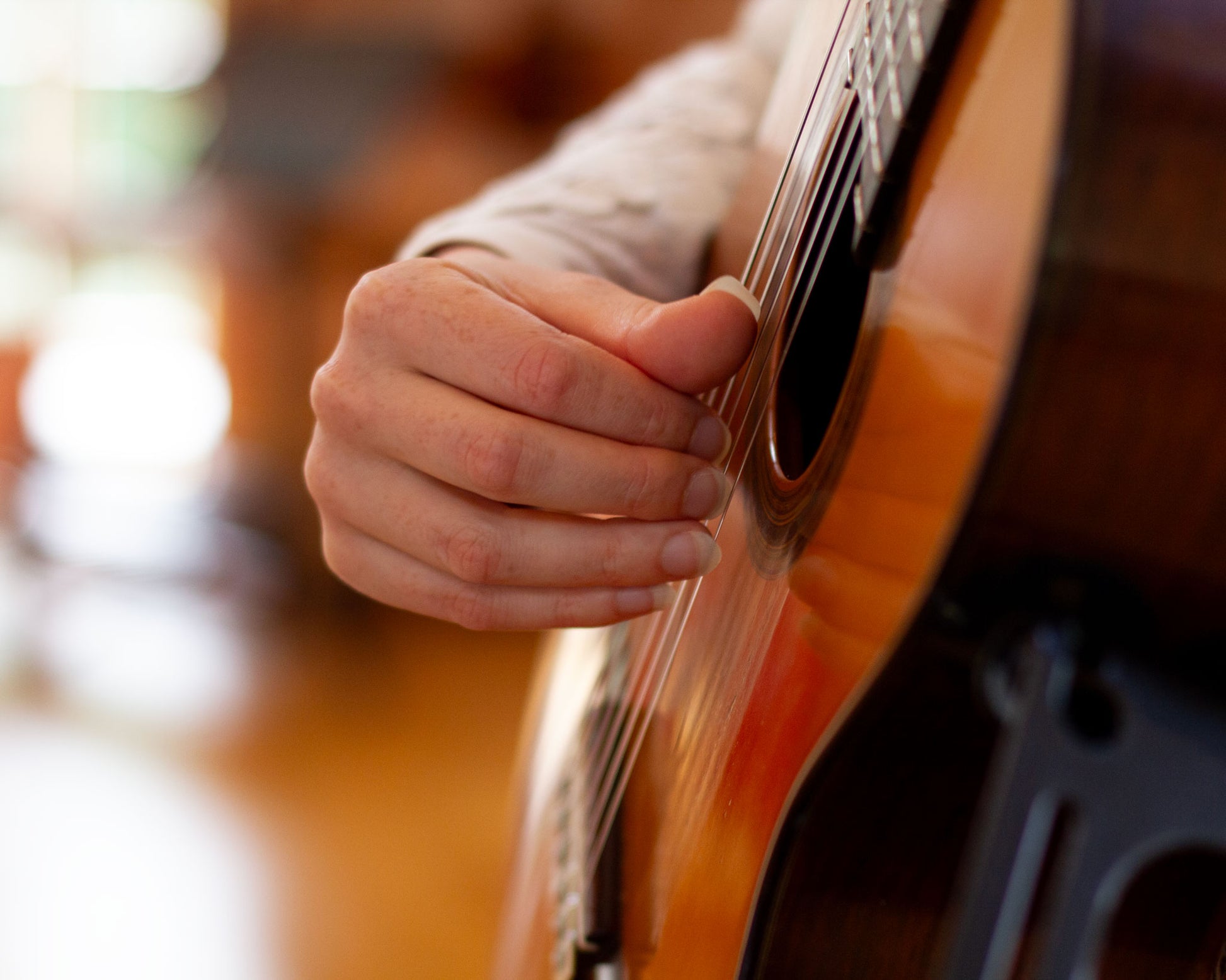 Detail of Elise Neumann playing guitar at the recording sessions for her solo album "Bach & Castelnuovo-Tedesco" for Carpe Diem Records in Schloss Borbeck, Essen, Germany. 