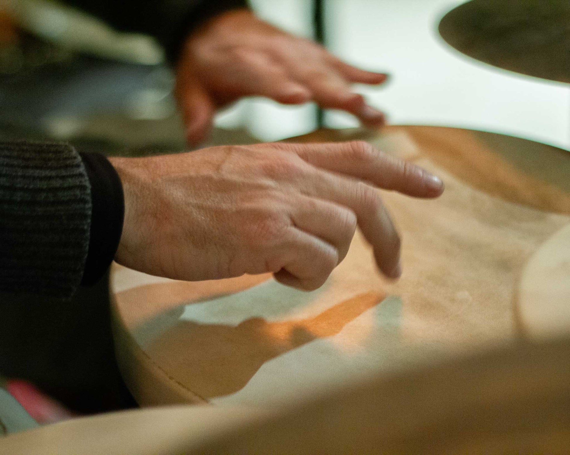 Hands of Jarrod Cagwin, playing percussions at the recording sessions of Natasa Mirkovic' album "En El Amor" in the former Synagogue of St. Pölten, Austria. 