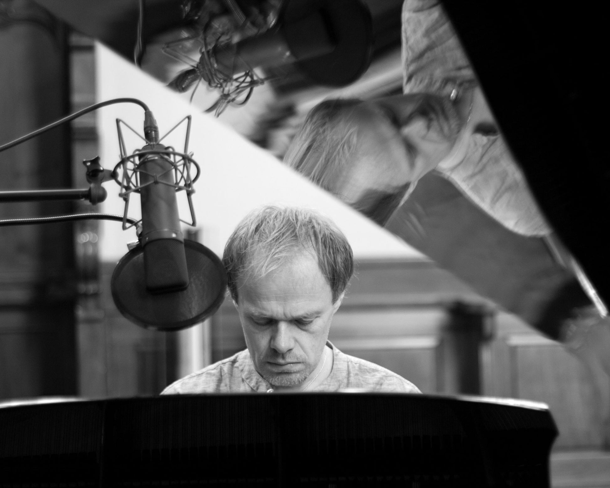 Petter Udland Johansen playing piano during the recording sessions for his album "The road not taken" in the Küsnacht church, Zurich (Switzerland)