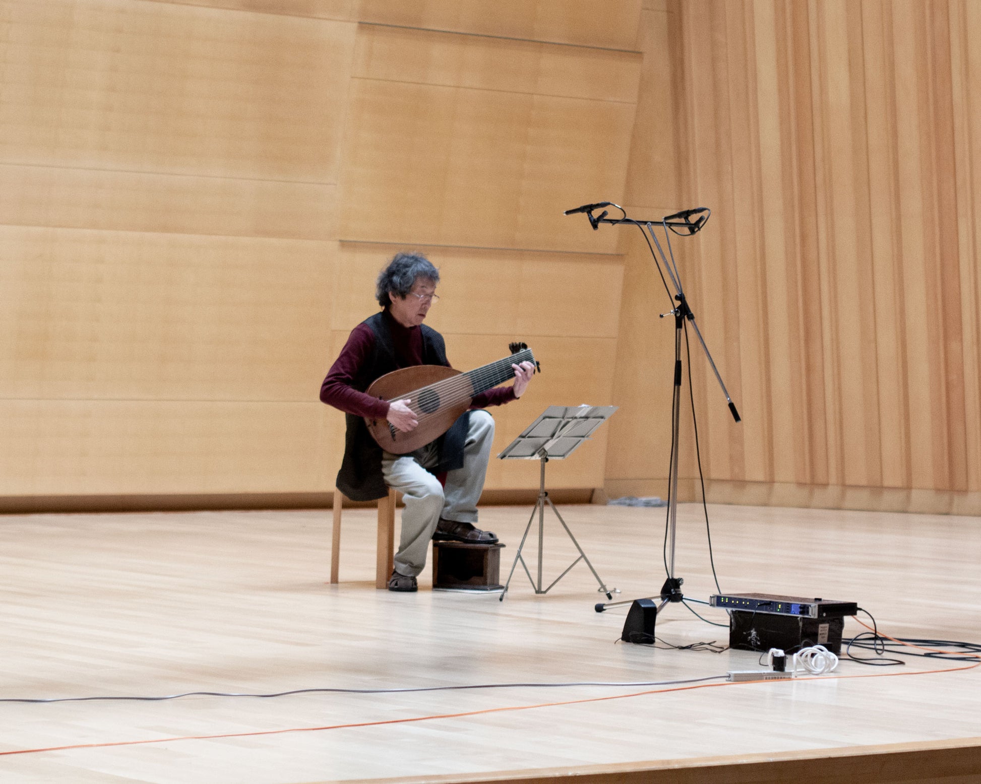 Toyohiko Satoh playing his original Greiff lute made in 1611 during the recording sessions for his album "Iki" in a concert hall in south Japan. 
